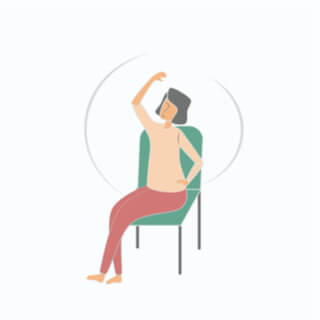 تمرين الجلوس مع التمديد الدوراني لأسفل الظهر (Seated lower back rotational stretch)