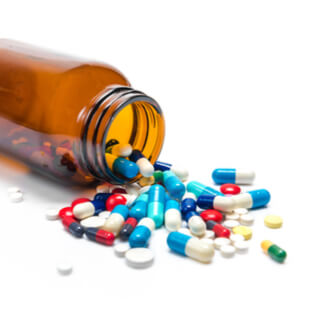 1. علاج تقوس الظهر بالأدوية