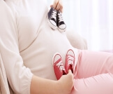 متى يبدأ الثقل في حمل التوأم؟