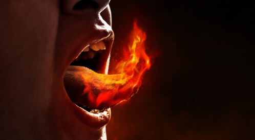 أسباب حرقة اللسان: تعرف على أبرزها